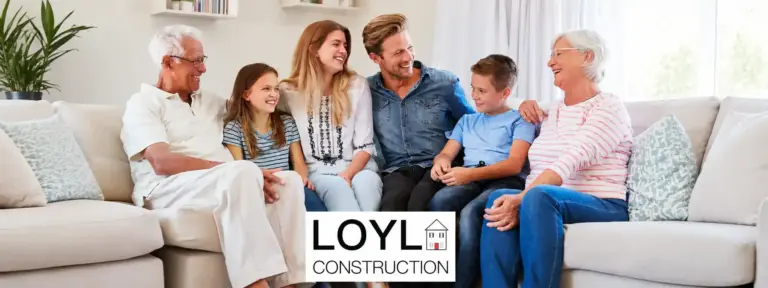 Multigenerational family relaxing in a living room with the LOYL Construction logo