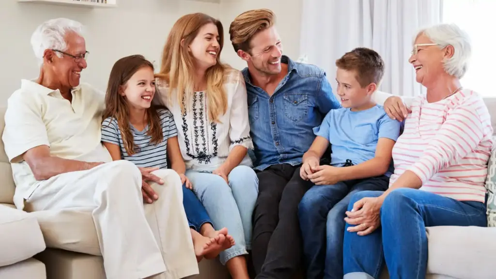 Multigenerational family spending time together in a comfortable lower-level living space