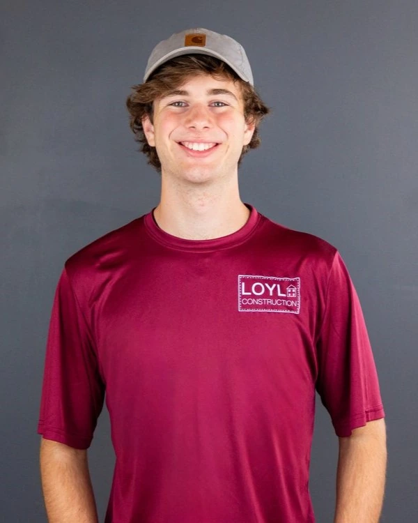 Soren Holsclaw, Construction Manager at LOYL Construction, wearing a branded company shirt
